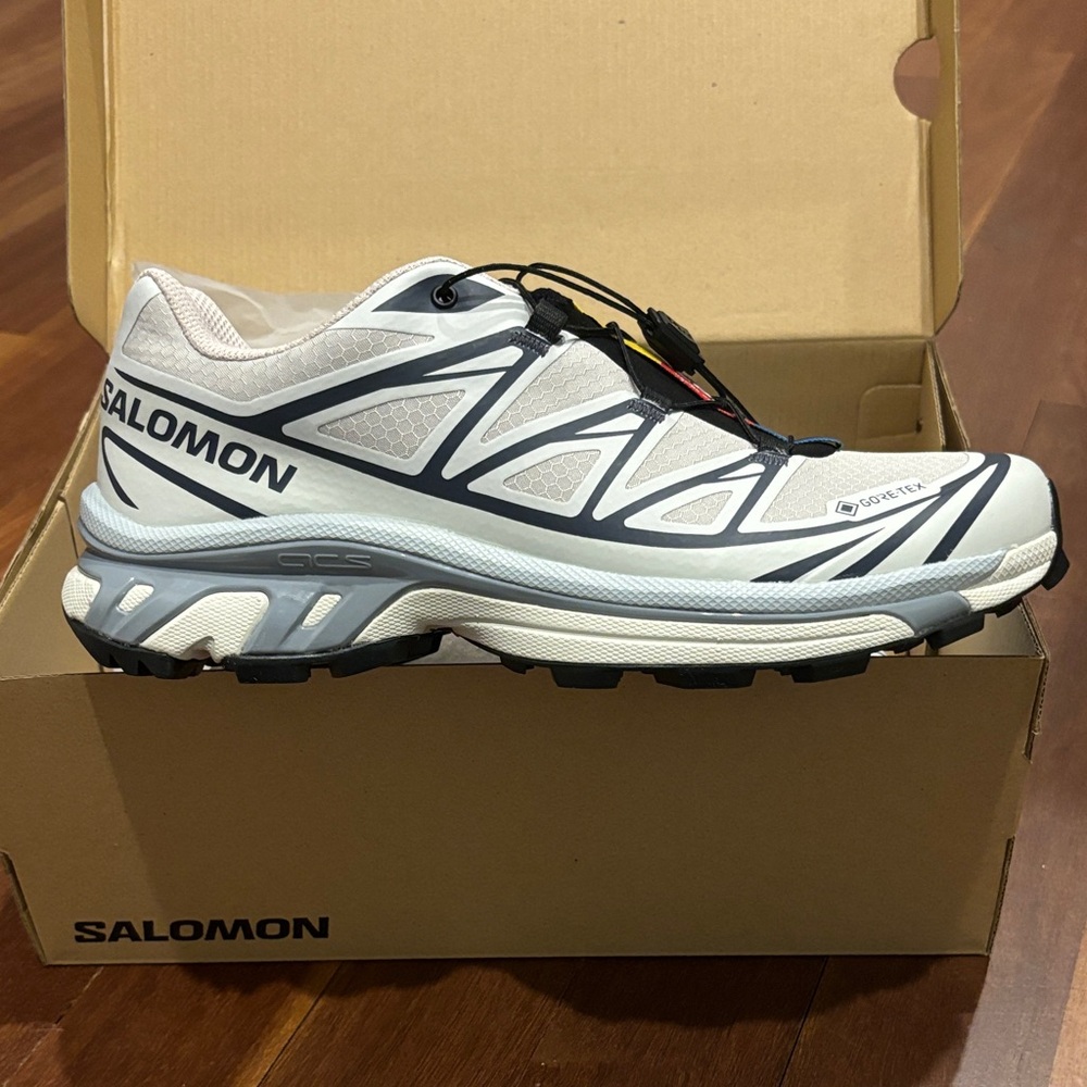 NEW with tags. Salomon White and Black Athletic Shoes (women’s 8)